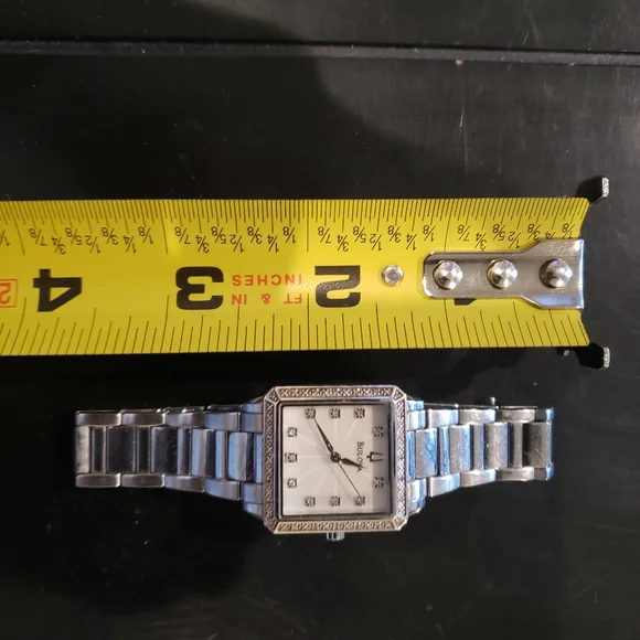 Bulova woman's watch & Tiffany &Co earings